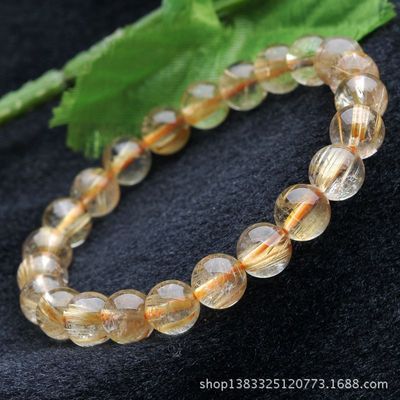 纯天然精品8mm巴西钛晶金钛晶圆珠手链 招财之选，编号y96y48的产品解析